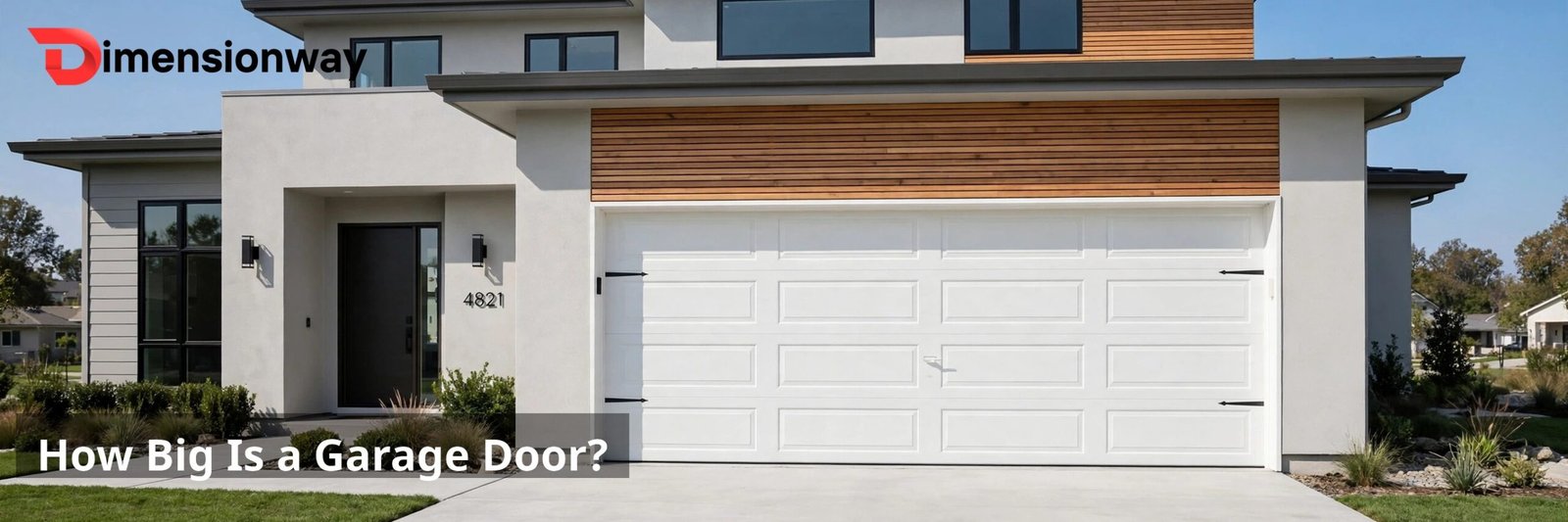 A suburban home with a wide double garage door in front.