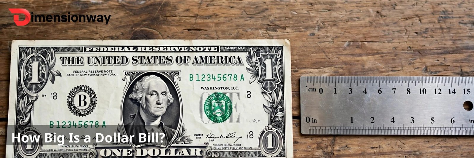 US dollar bill lying flat on a wooden table next to a ruler.