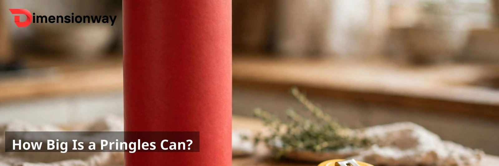Pringles can standing on a kitchen counter next to a ruler.