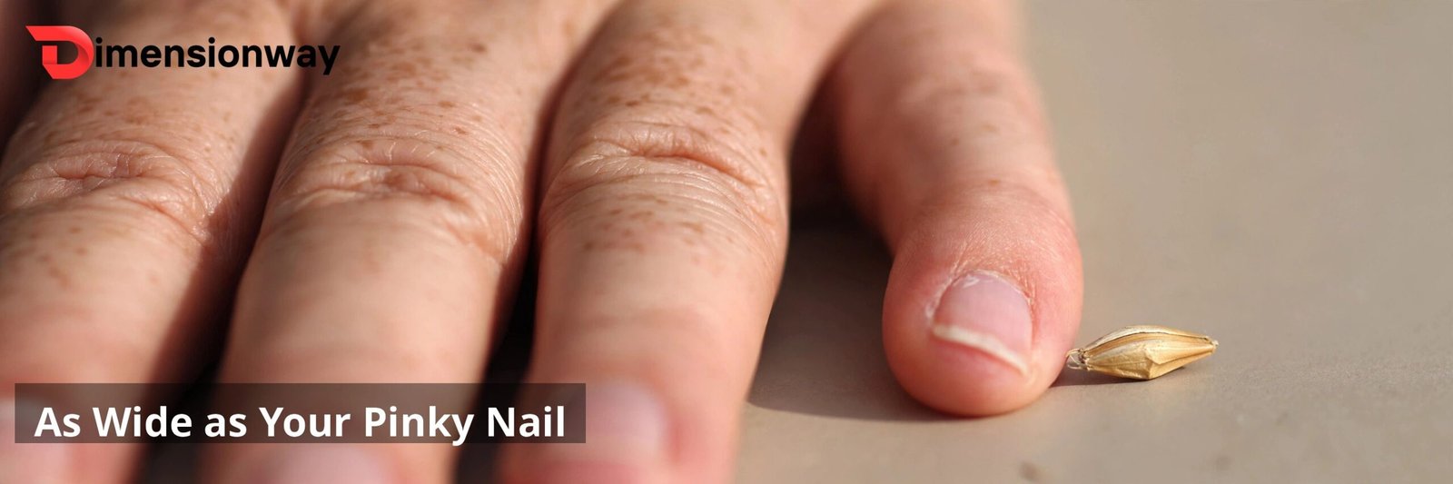 Barleycorn next to a pinky fingernail.