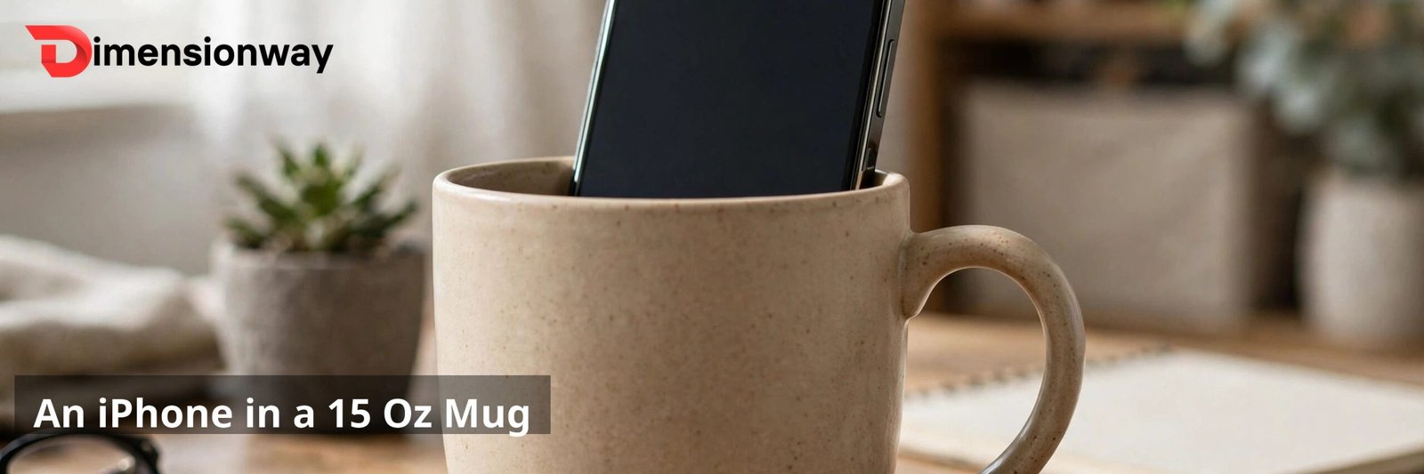 A smartphone standing upright inside a large beige ceramic coffee mug on a desk.