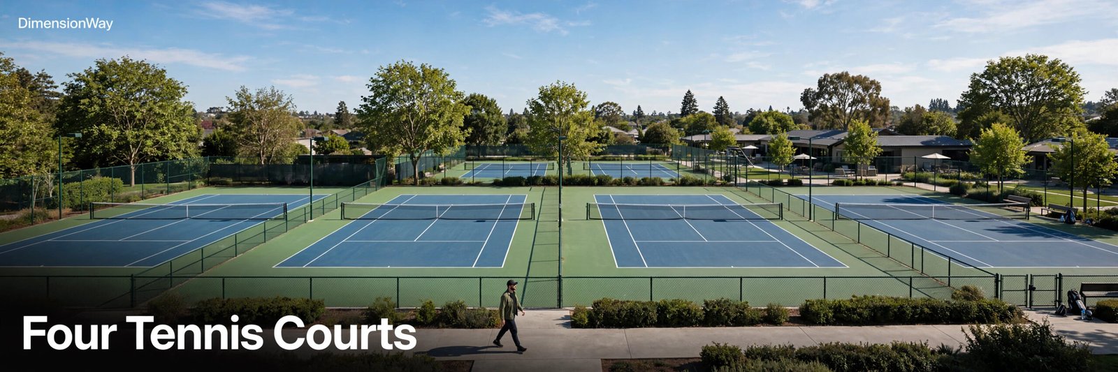 Person strolling past four tennis courts in a row at a tennis club.