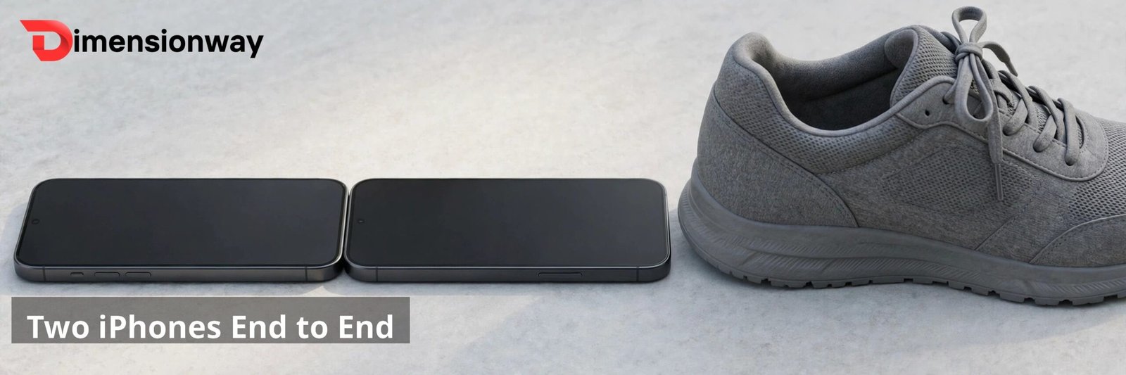 Two smartphones laid end to end next to a men's sneaker.