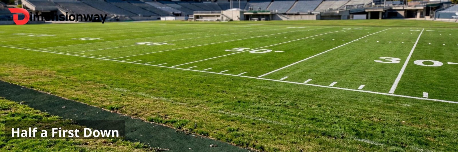 An American football field with yard lines seen from the sideline.