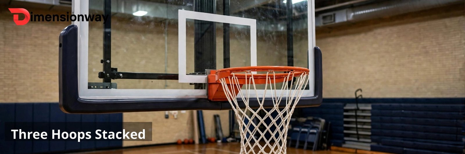 A basketball hoop and rim in a gym with the backboard and court below.