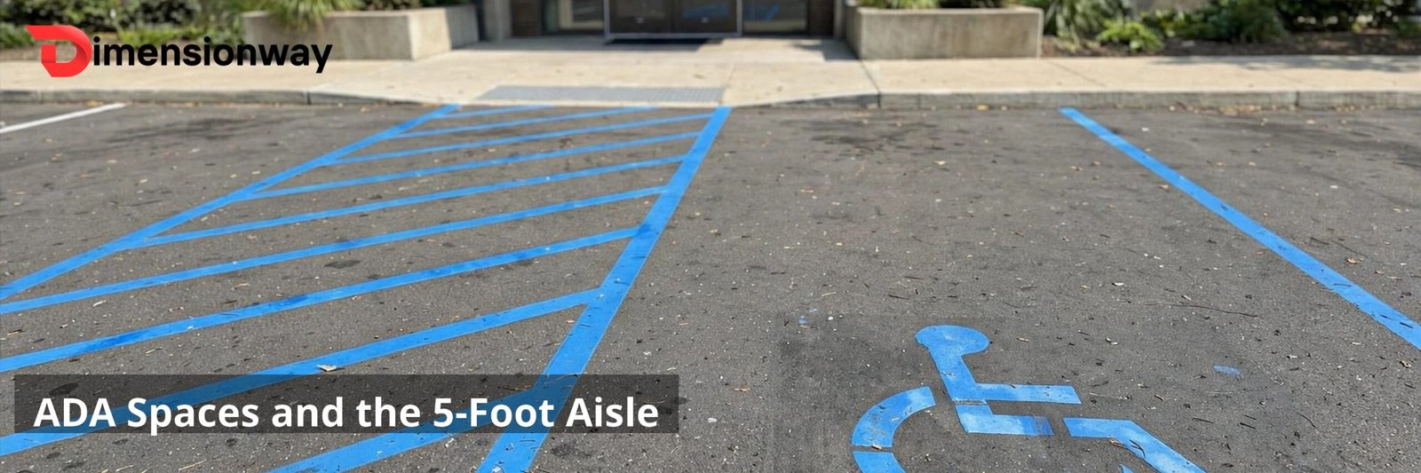 An ADA accessible parking space with blue lines, wheelchair symbol, and a striped access aisle.