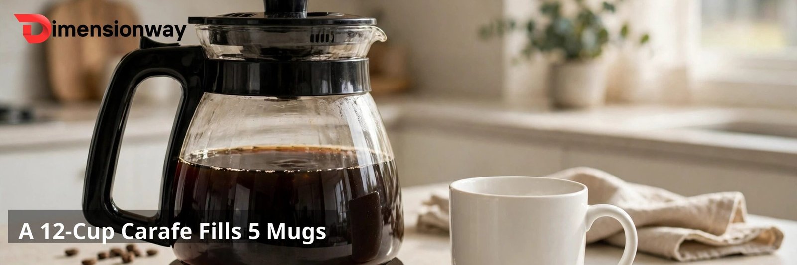 A glass drip coffee maker carafe full of coffee next to a white ceramic mug.