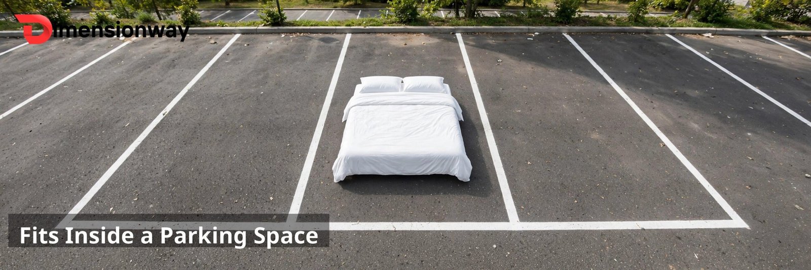 A king size mattress placed in the middle of an empty outdoor parking space.