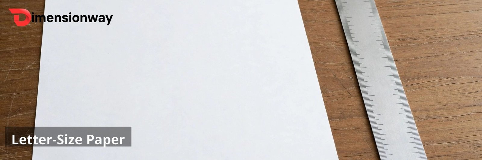 A sheet of white letter-size paper on a desk next to a ruler.
